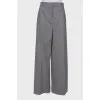 Light gray wool trousers with tag