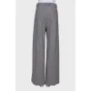 Light gray wool trousers with tag