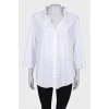 White blouse with hidden fastening