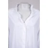 White blouse with hidden fastening