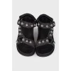 Black sandals with metal inserts