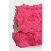 Textile clutch bag in the shape of roses