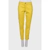 Yellow jeans with side zipper