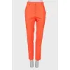 Wool orange trousers with tag