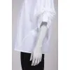 White blouse with binding on the sleeves
