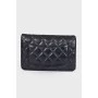 Quilted black leather bag