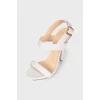 White embossed sandals
