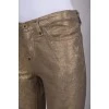 Patterned golden trousers