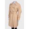 Beige double-breasted trench coat