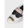 Slip-ons with decor and spikes