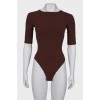 Brown short sleeve bodysuit with tag