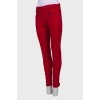 Red jeans with zipper pockets