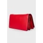 Leather clutch with detachable strap