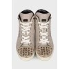 Leather sneakers with studs and rhinestones
