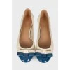 Beige ballerina shoes with blue toecap