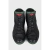Men's black sneakers with green inserts