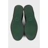 Men's black sneakers with green inserts