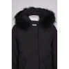 Black parka with fur on the hood with a tag