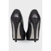 Black leather embossed heels 