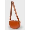 Lacquered brown bag