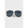 Sunglasses with dark blue lenses