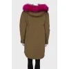 Green parka with pink fur with tag