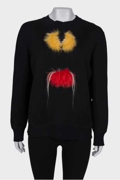 Black sweatshirt with fur inserts