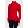 Red sweater with a zipper at the collar