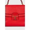 Red leather trapeze bag