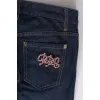 Jeans with rhinestone brooch