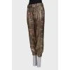 Pants with lurex and print