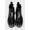Patent black boots with a zipper