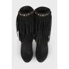 Black suede boots with fringes