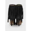 Black suede boots with fringes