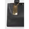 Black leather bag with mirror insert