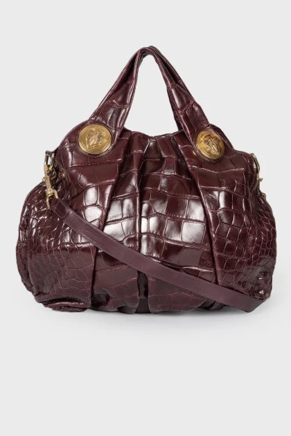 Burgundy bag with gold hardware