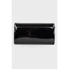 Lacquered clutch bag with chain