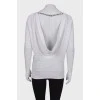 Sweater with open back and rhinestones