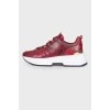 Red embossed leather sneakers