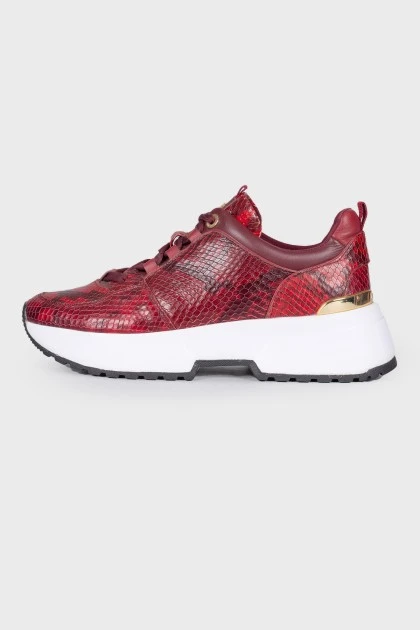 Red embossed leather sneakers