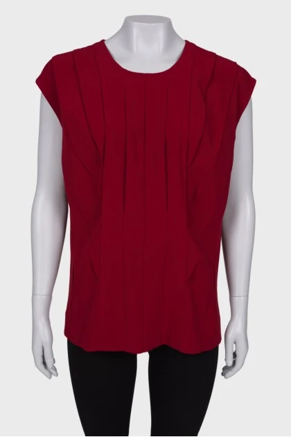 Red sleeveless blouse
