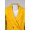 Yellow coat with knitted sleeves