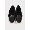 Leather slip-ons with fur