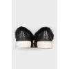 Leather slip-ons with fur