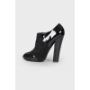Black combination heeled ankle boots