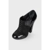 Black combination heeled ankle boots