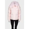 Cropped down jacket with fur on the collar, with a tag