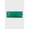 Green leather clutch