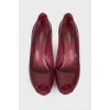 Lacquer burgundy shoes with a lock