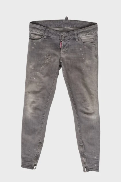 Gray jeans with paint stain effect